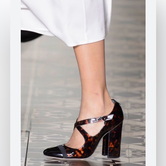 Tory Burch Shoes - Tory Burch Amble Tortoise Patent Crisscross Pumps Size 9